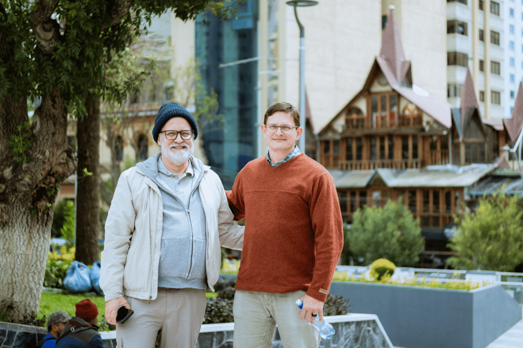 Two men smiling for a photo